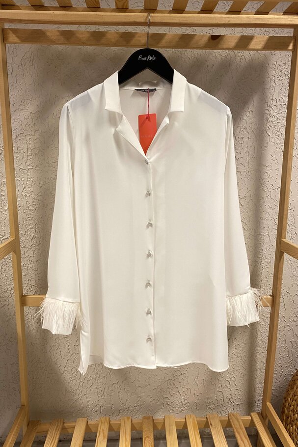BLOUSE WITH FEATHERS
