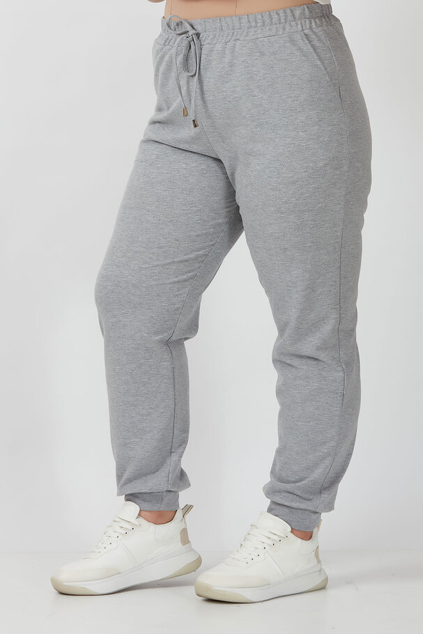 JOGGER TROUSERS WITH ELASTIC HEMS