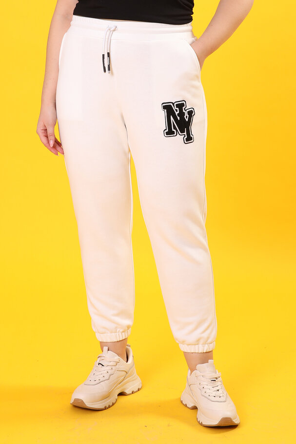 PLUSH JOGGING TROUSERS WITH PATCH
