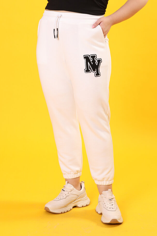 PLUSH JOGGING TROUSERS WITH PATCH