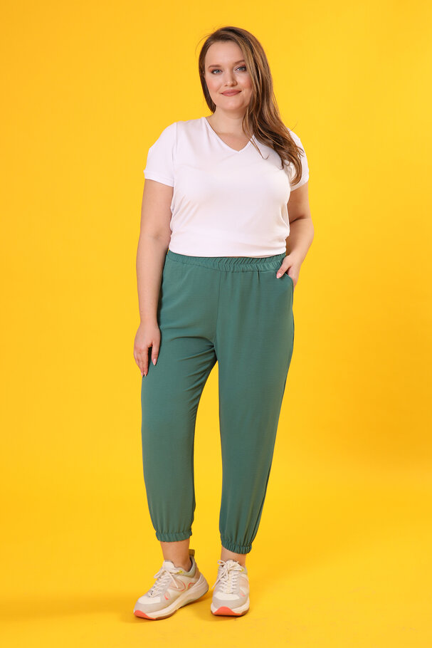 TROUSERS WITH FLOWING FABRIC