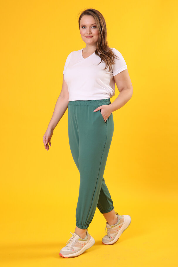 TROUSERS WITH FLOWING FABRIC