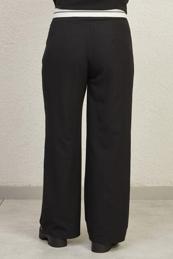 TROUSERS WITH TURN-UP WAIST