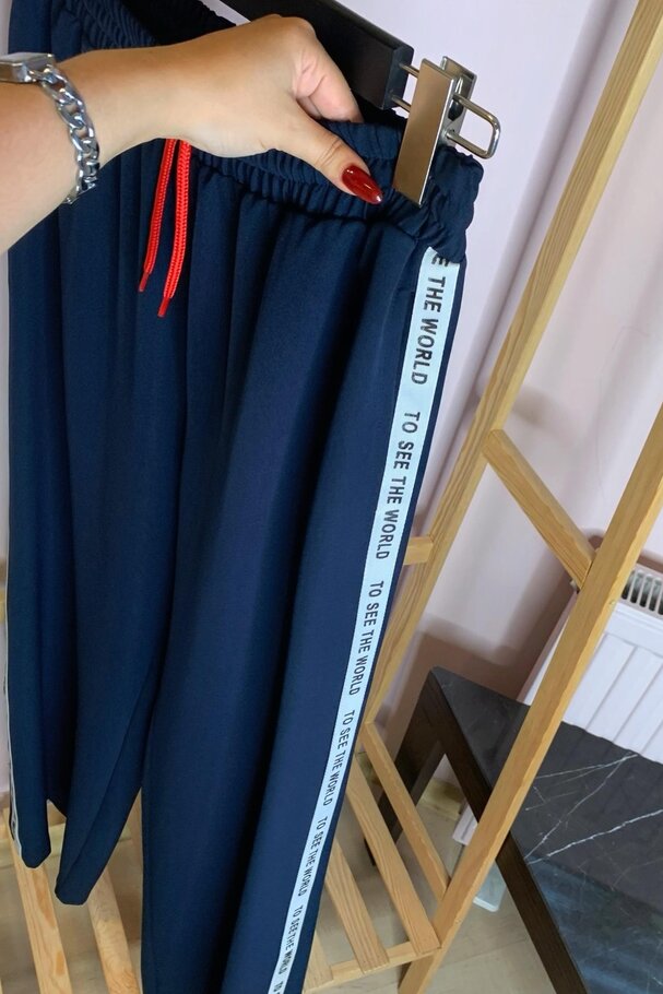 WIDE-LEG PANTS WITH SIDE STRIPE DETAIL